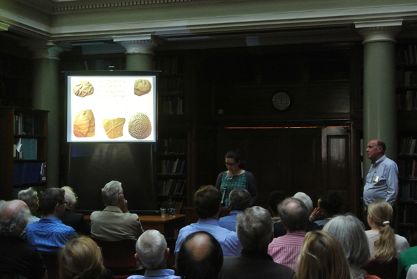 Sarah Day, GSL Earth Science Communicator, introduces Paul Taylor from the Natural History Museum, in the Upper Library